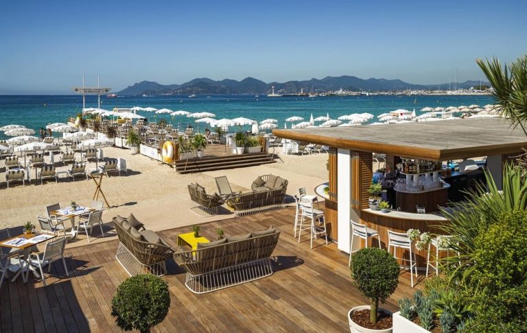 private beach in Cannes with deckchairs facing the sea