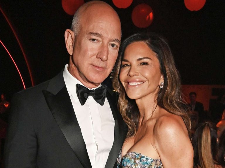 Cannes Film Festival packs VIP Man in black suit and woman in elegant dress, smiling at a glamorous event.